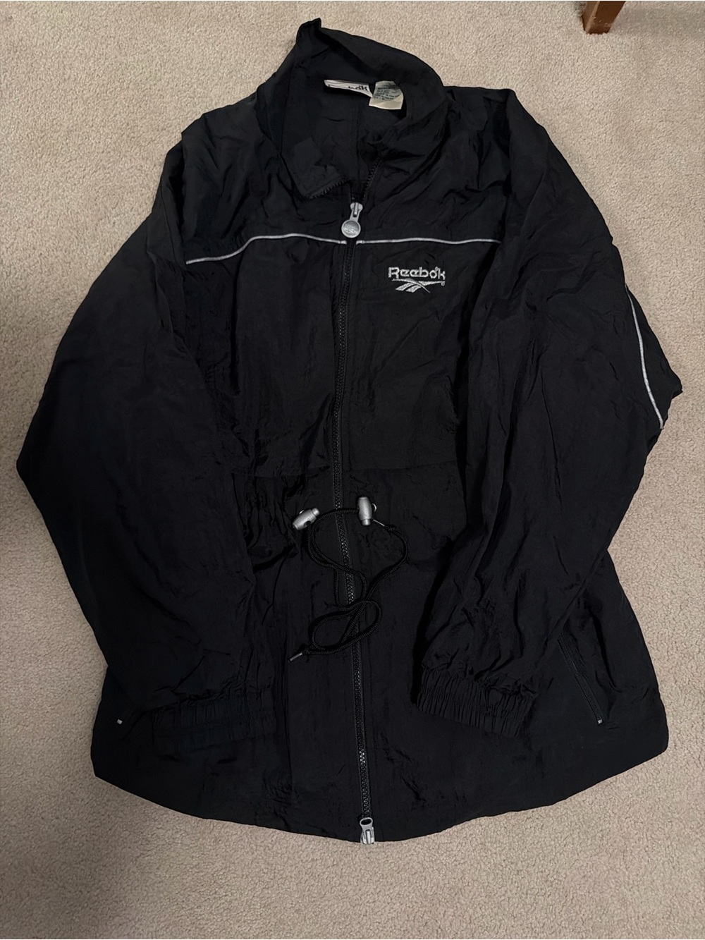 Reebok Black Men's Lightweight Windbreaker with Reflective Trim